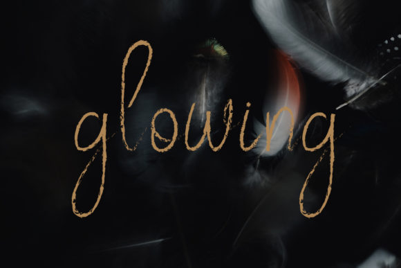 Glowing Font: Elevate Designs with Romantic Handwritten Style